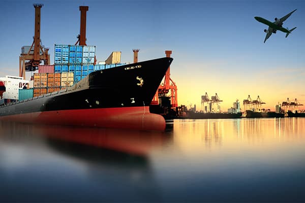 Container ship at port at dusk